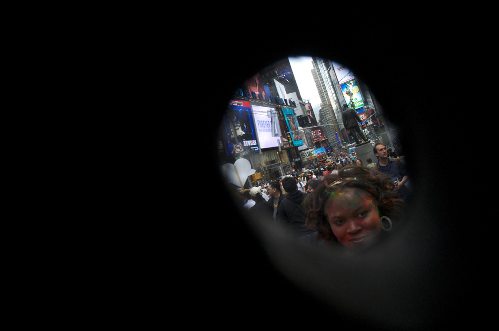 New York, United States. General view right through an eye hole in the head of my Hello Kitty costume. Immigrants dressed up as entertainment symbols ask for donations after posing for pictures in Times Square. 2013 ©Joana Toro.